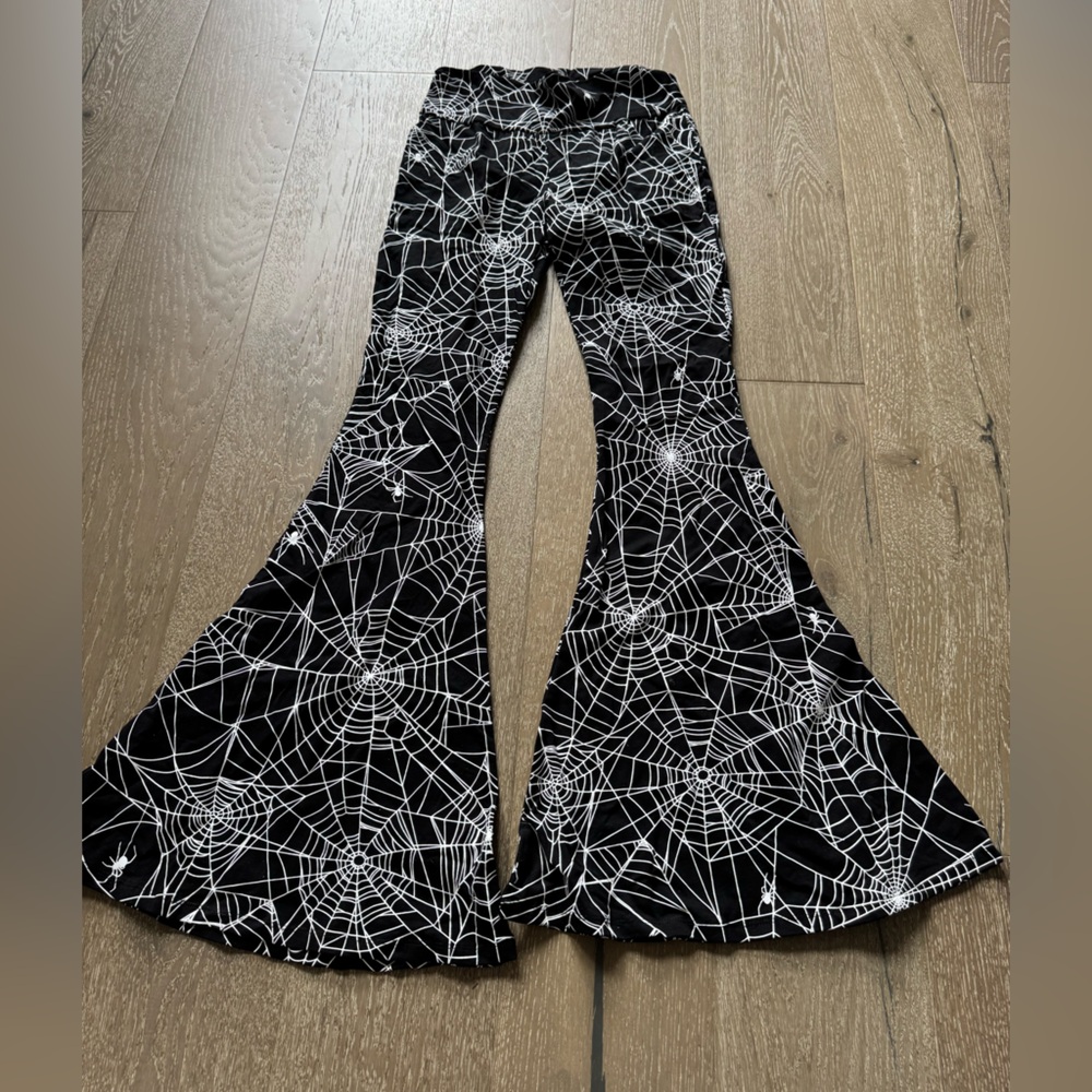 Dolls Kill Trickz N’ Treatz total spinster Spider Web Flare Pants